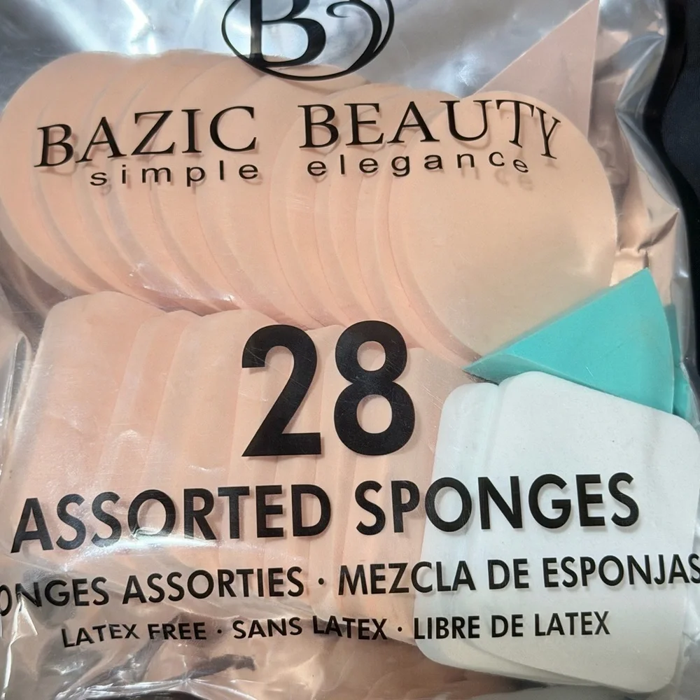 Assorted Makeup Sponges - Peach, White & Teal Only 21 on package.